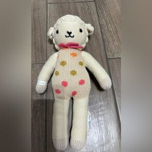 Cuddle + kind Lucy the lamb.